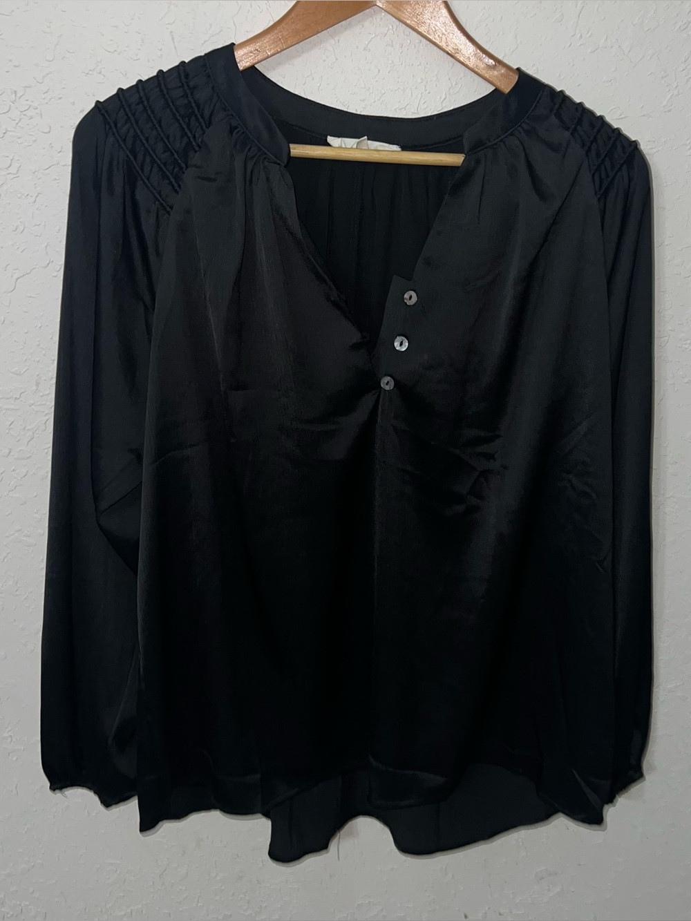 Entro BNWOT black satin long-sleeve blouse Size Large.
